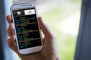 A mobile phone running TechAnywhere field service software for contractors.